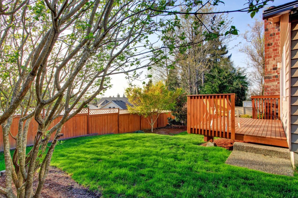 New deck and fence installed in the backyard